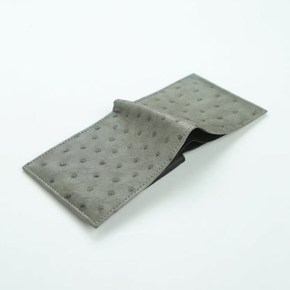 Full-quill ostrich exterior open flat showing front and back panels