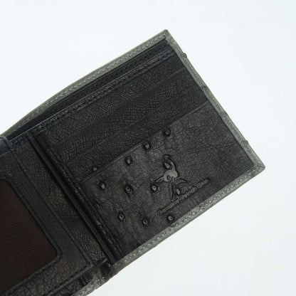 Black ostrich accent panel with Genuine Ostrich Skin embossed logo