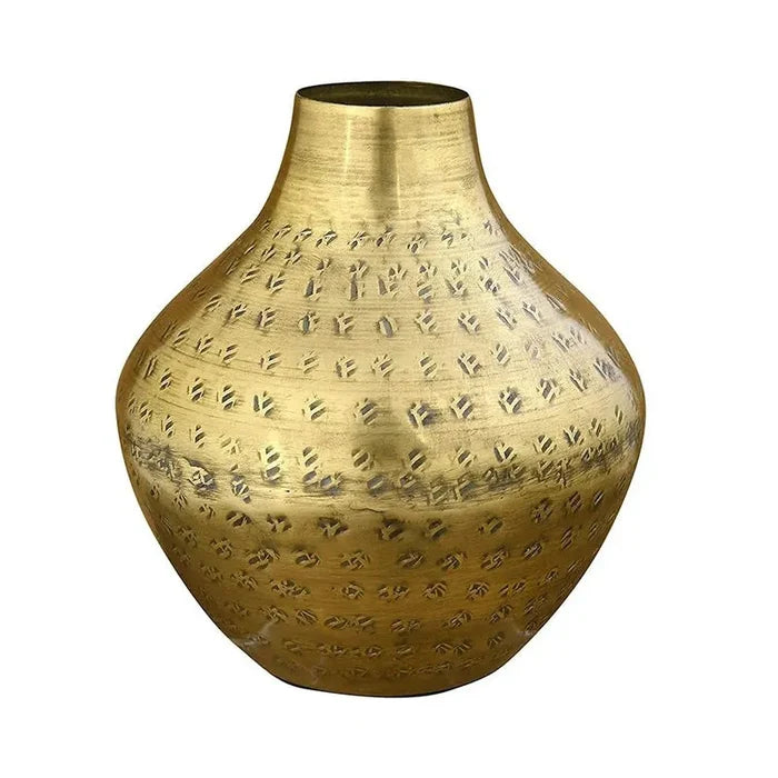 Golden brass vase with geometric patterns, a stunning decorative accent in hammered metal finish