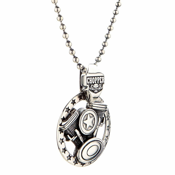 Suspended on a beaded chain, this angled shot reveals the 3D depth of the silver V-twin cylinders and lower derby cover.