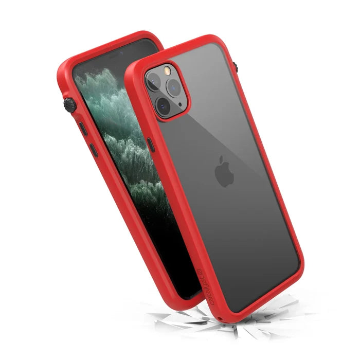 Two iPhone 11 Pro Max devices in Catalyst Case US Impact Protection Cases, with transparent backs and bold red edges. One is angled above a cracked surface, showcasing Drop Proof design, impact resistance, and wireless charging support.