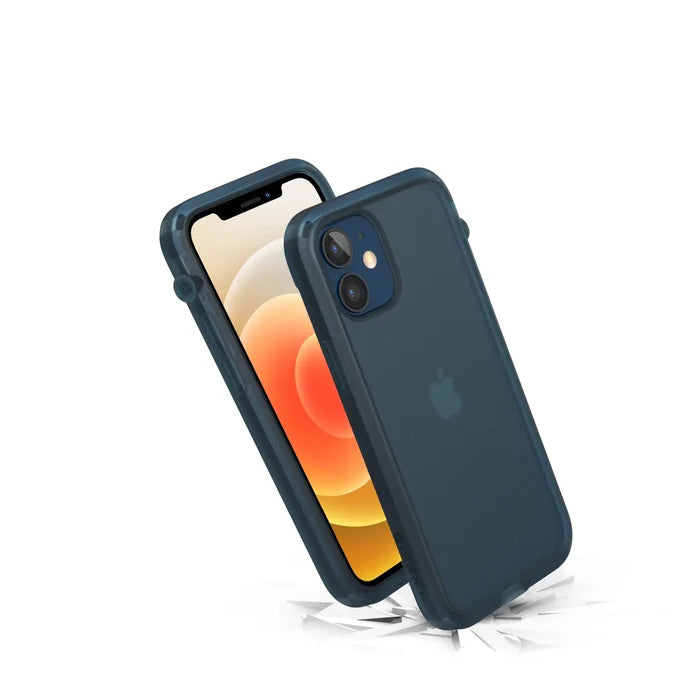 The Catalyst Case US iPhone 12 mini - Influence Case is shown in blue, with a phone inside and an empty case beside it. Cracked graphics hint at drop protection, and the slim design supports wireless charging without removal.