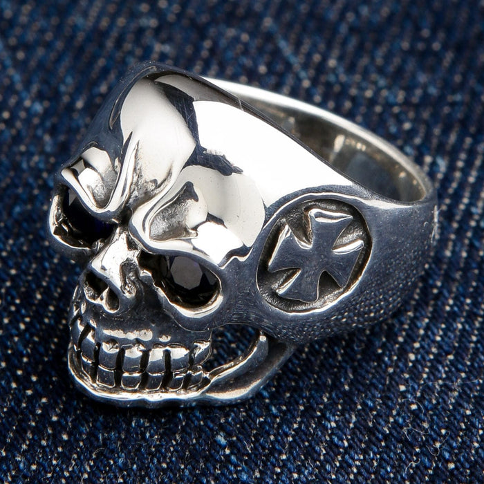 Side view of the iron cross skull ring, showing the engraved cross detail on the temple.