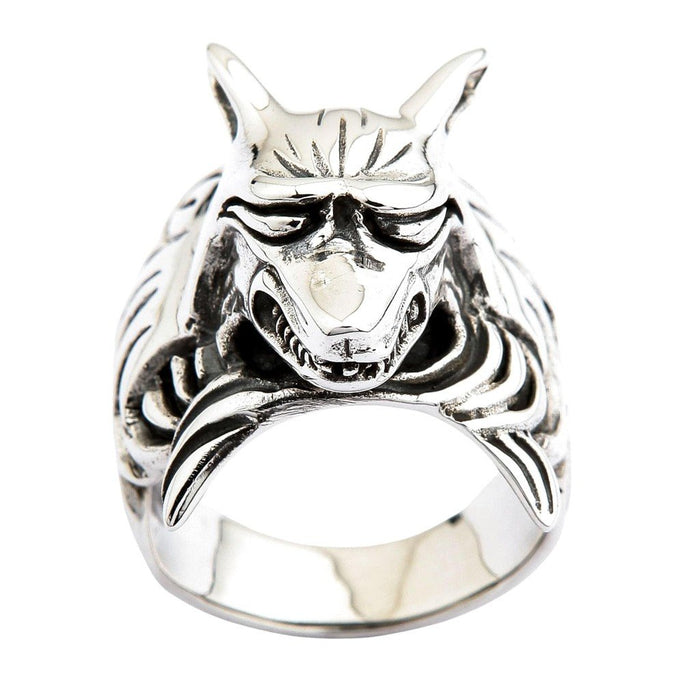 Direct front view of sterling silver kitsune yokai ring showing horned demon face with menacing grin and ornate scrollwork band