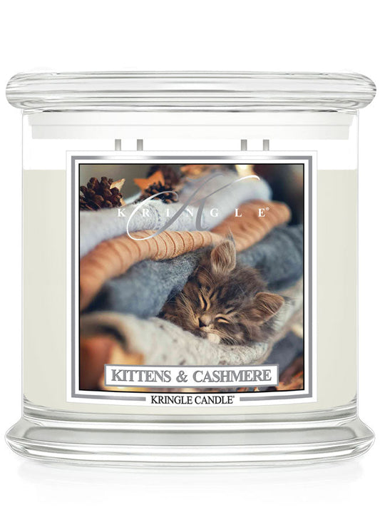 Kringle Candle with a kitten and cashmere 4-wick candle with a kitten label on a white background