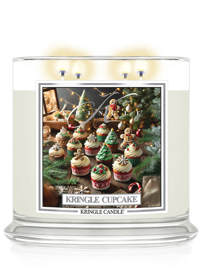 4-wick candle labeled "Kringle Cupcake" with festive cupcake imagery featuring Christmas trees and gingerbread men.