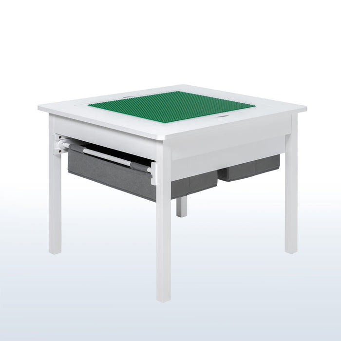 Kids' play table for Lego building bricks with reversible building base top and two pull-out drawers.