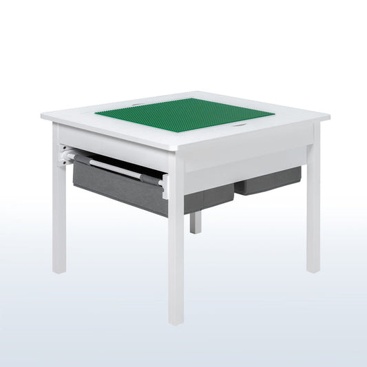 Kids' play table for Lego building bricks with reversible building base top and two pull-out drawers.