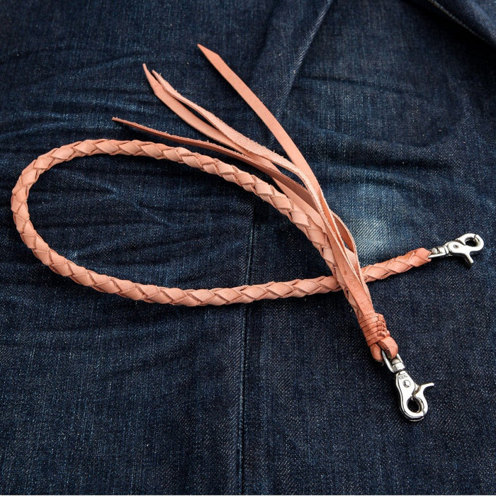 Natural light tan braided leather wallet chain displaying handmade weave pattern and leather fringe details