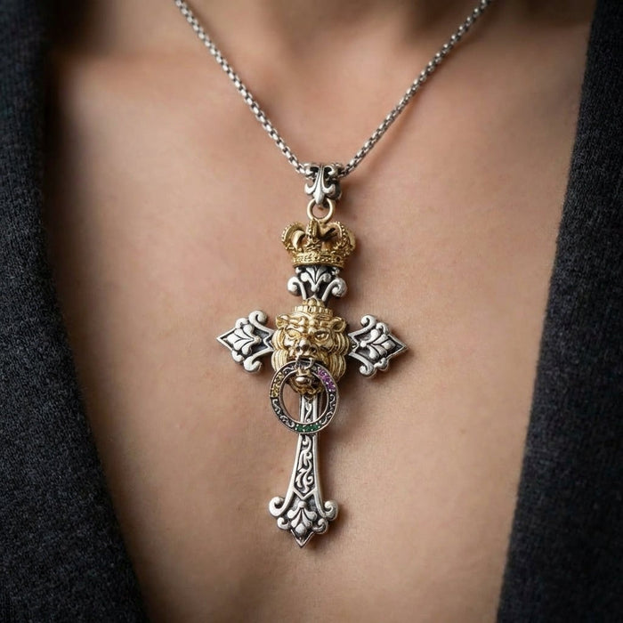 Rasta cross pendant with lion and crown featuring Ethiopian colors worn as statement necklace