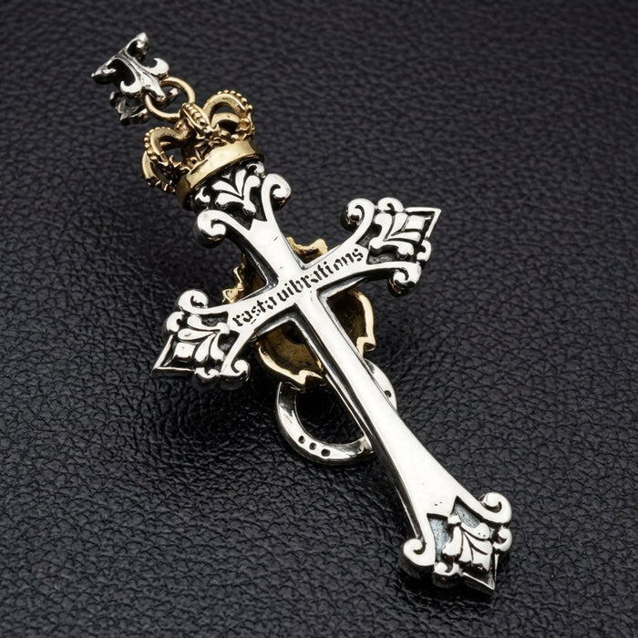 Back view of Lion of Judah cross pendant showing rastavibrations brand engraving on sterling silver