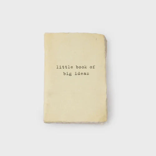 Cream-colored notebook with Little Book of Big Ideas cover design in boho style