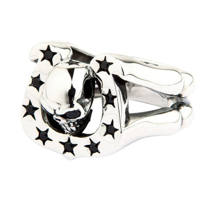 Side profile of handcrafted skull horseshoe ring showing split shank band design and black CZ stone settings