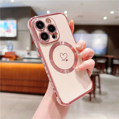 a woman holding a phone case with a heart on it
