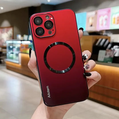 a person holding a red iphone case