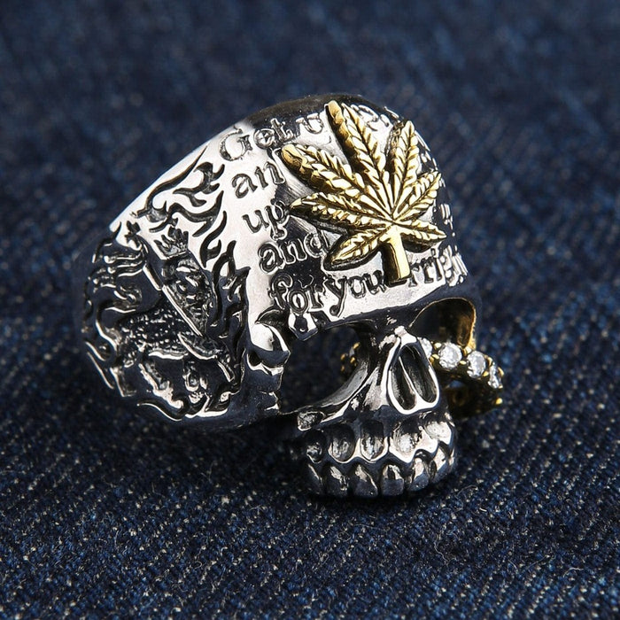 Opposite side view of sterling silver marijuana skull ring with engraved text details