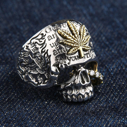 Opposite side view of sterling silver marijuana skull ring with engraved text details