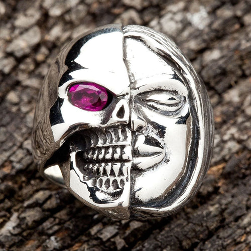 A men's Memento Mori two face ring in sterling silver, showing the half skull, half human face design.
