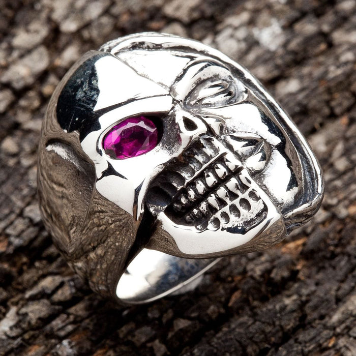 A piece of stoic philosophy jewelry, this half skull, half face ring is a symbol of life and death.