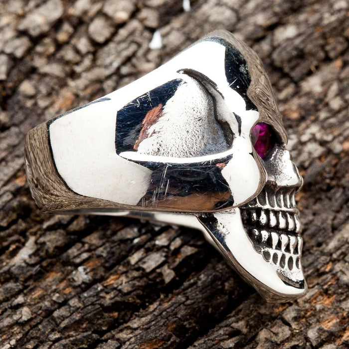 A side profile view of the Memento Mori ring, showing the polished sterling silver band.