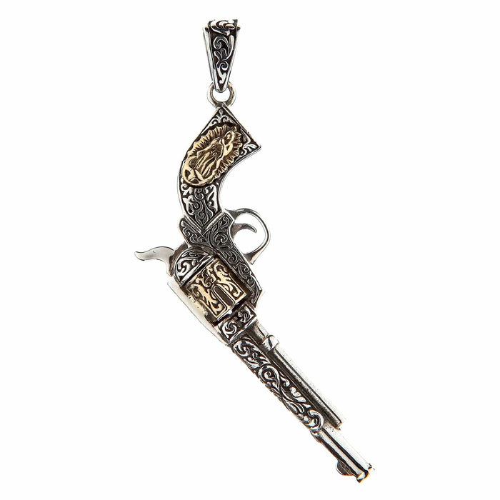 A two-tone Mexican gun pendant, handcrafted from sterling silver with brass accents on the grip and cylinder.