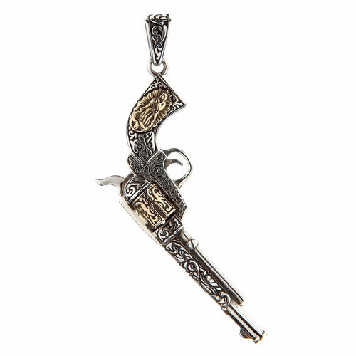 A two-tone Mexican gun pendant, handcrafted from sterling silver with brass accents on the grip and cylinder.