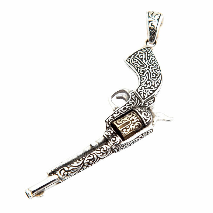 A piece of men's rockabilly gun jewelry, this revolver pendant is crafted from sterling silver.
