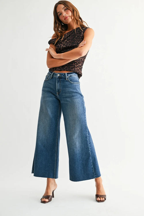 Mid rise wide leg flare crop denim jean in blue with frayed hem