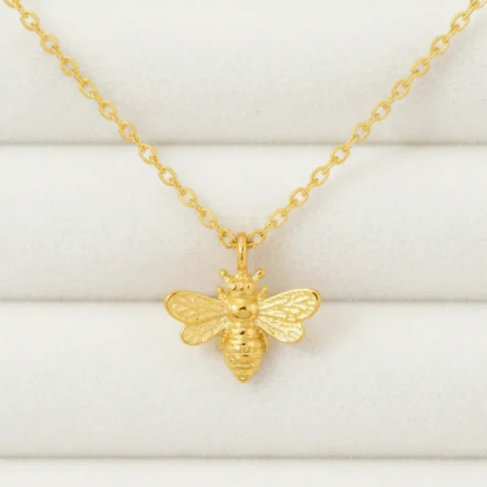 Mini bee gold pendant necklace with detailed wings on dainty chain