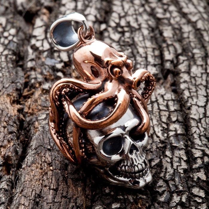 An angled view of the gothic Kraken skull pendant, highlighting the detailed tentacles.