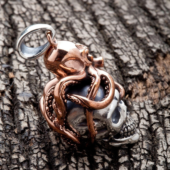 The heavy Kraken skull pendant.
