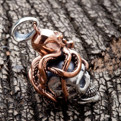 The heavy Kraken skull pendant.