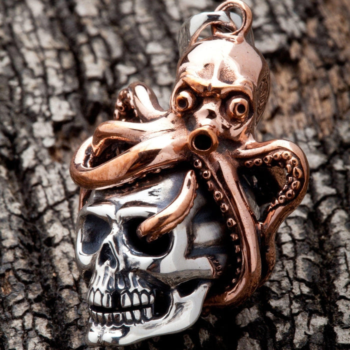 A close-up macro shot of the polished bronze octopus, showing the detailed suction cups.