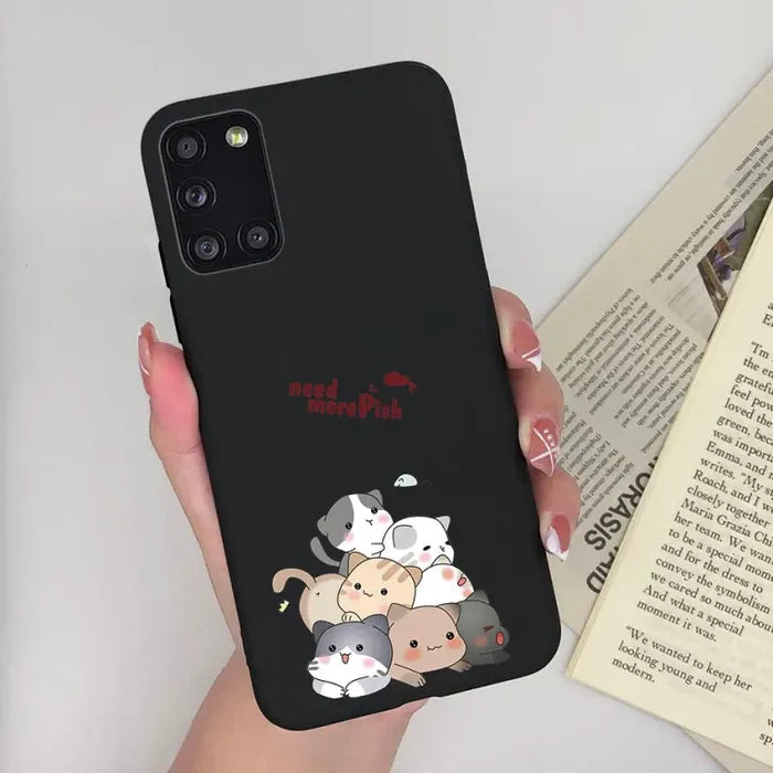 a woman holding a phone case with a cartoon character