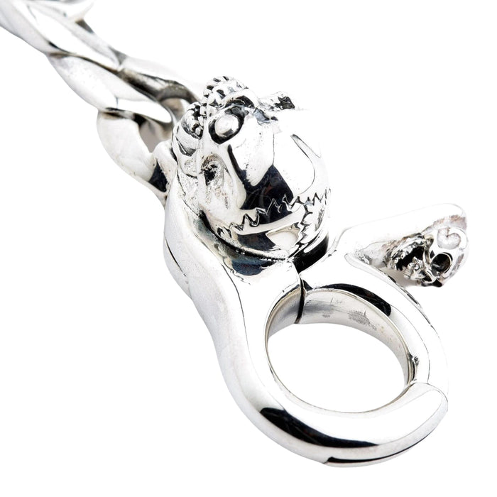 Macro shot of heavy duty silver keychain hook and skull detail