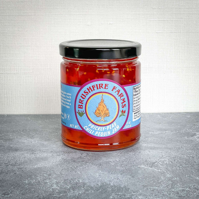 Brushfire Farms Prickly Pear Chili Pequin Jam from San Antonio, TX on a table.