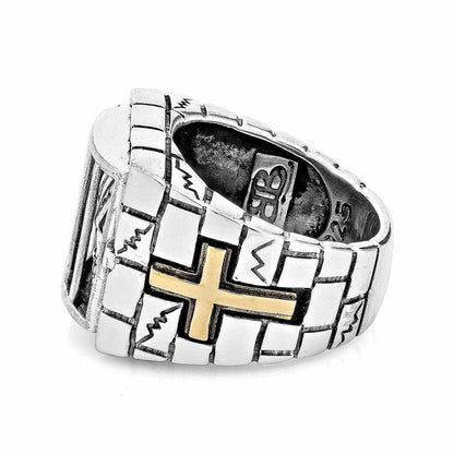 A detailed side view of the prison ring, highlighting the beautiful 14K gold-plated cross on the stone wall band.