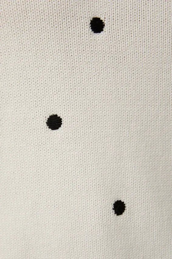Puff short sleeve polka dot sweater with white fabric and black embroidered dots