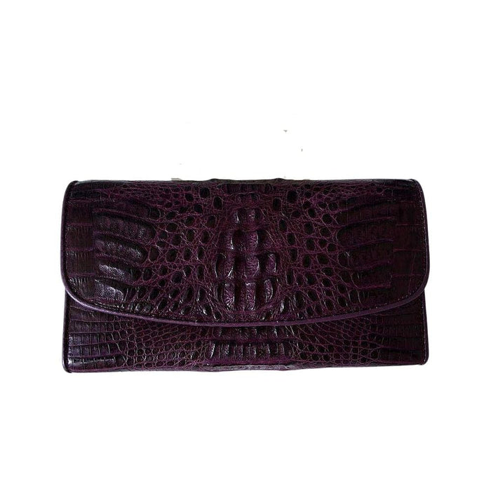 Purple crocodile hornback leather trifold women's wallet, closed front view with snap flap