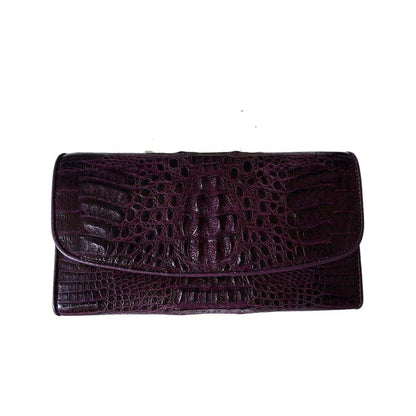 Purple crocodile hornback leather trifold women's wallet, closed front view with snap flap