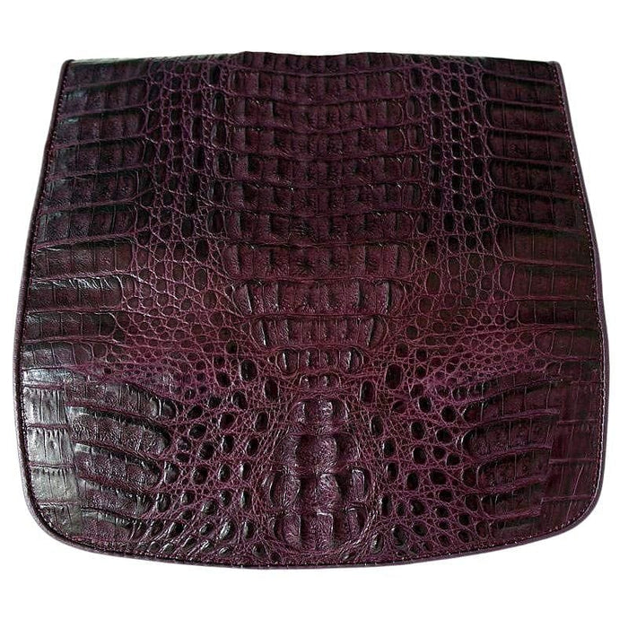 Full hornback crocodile skin panel of the purple trifold wallet with raised center ridge of bony scales