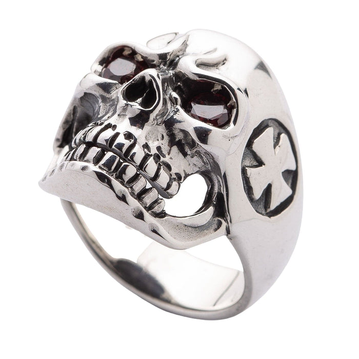 Low angle view of the skull ring highlighting the open jaw design and the solid construction of the sterling silver band.