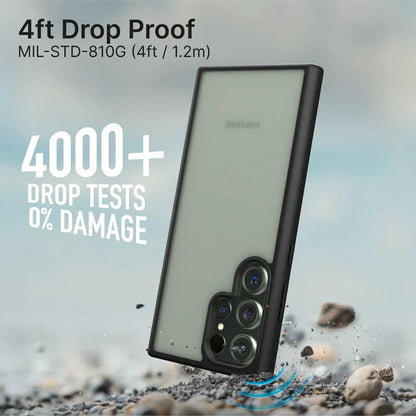 A Samsung Galaxy S23 Ultra with a Catalyst Case US black Impact Protection Case lies face down on pebbles. Text reads “4ft Drop Proof MIL-STD-810G” and “4000+ Drop Tests 0% Damage.” The rugged case shields the camera for extra protection.