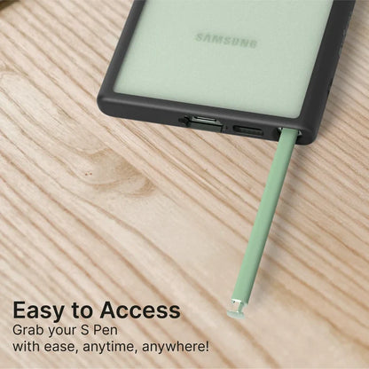 A Catalyst Case US Samsung Galaxy S23 Ultra with a black Impact Protection Case rests on light wood, its green S Pen partially removed. Text reads: “Easy to Access. Grab your S Pen with ease, anytime, anywhere!” Charging port is visible.