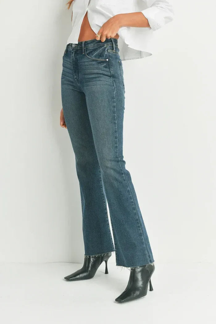 Dark wash high-waisted flare jeans from HR Scissor Cut, perfect for women’s boho chic clothing
