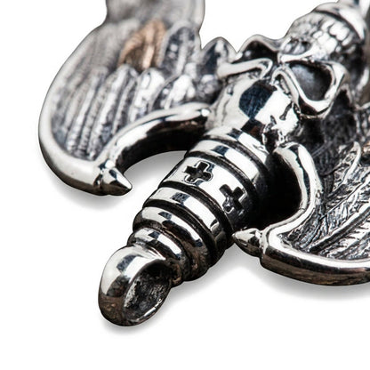 Extreme close-up of the lower spark plug section, detailing the ribbed silver texture, cross motifs, and bottom ring.