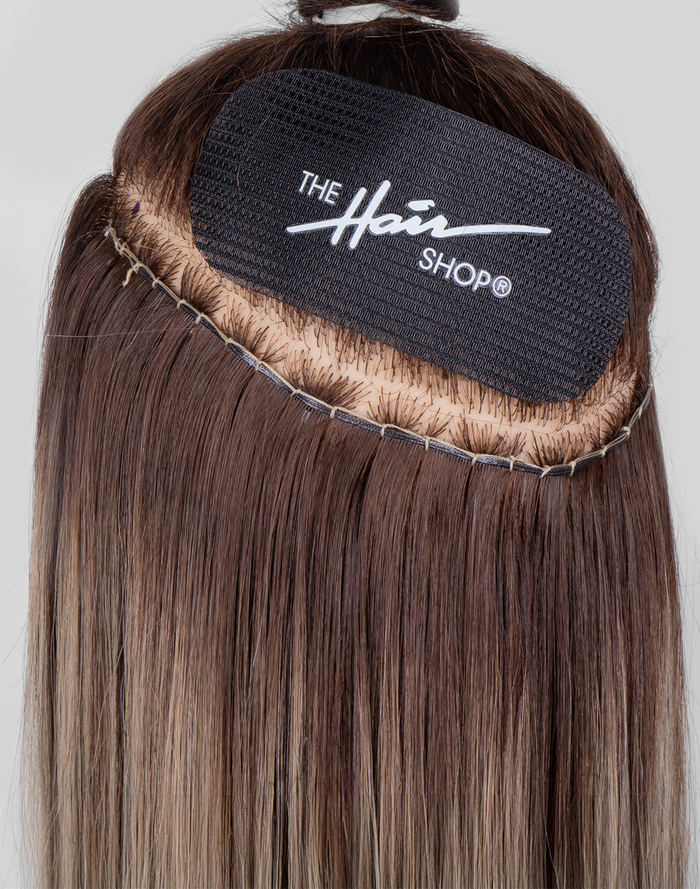 Smart Weft™ extension with Hair Gripper application shot.