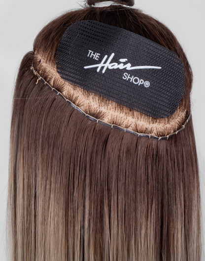 Smart Weft™ extension with Hair Gripper application shot.