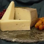 SOTTOCENERE cheese from Mitica, Italy, semi-soft, raw cow milk, with vegetable ash rind and truffle flakes.