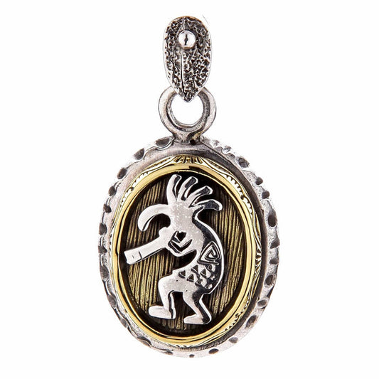 Sterling silver and brass Kokopelli pendant featuring a hand-carved Native American deity playing a flute.
